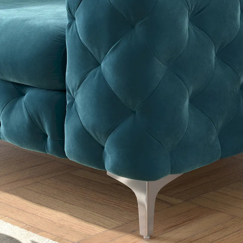 Fauteuil club en velours capitonné