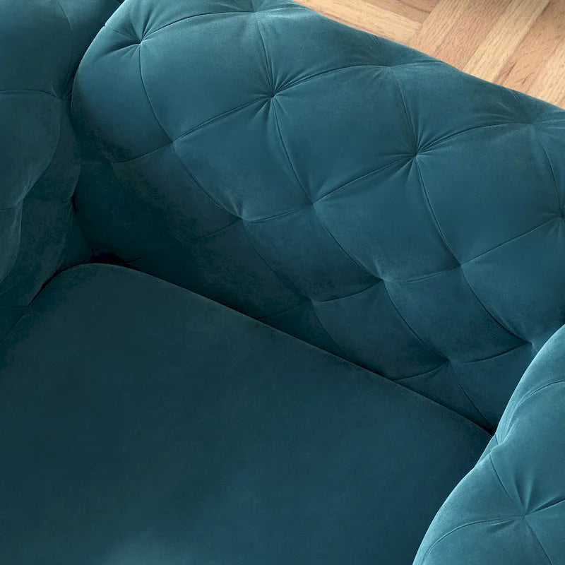 Fauteuil club en velours capitonné