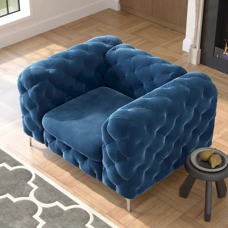 Fauteuil club en velours capitonné