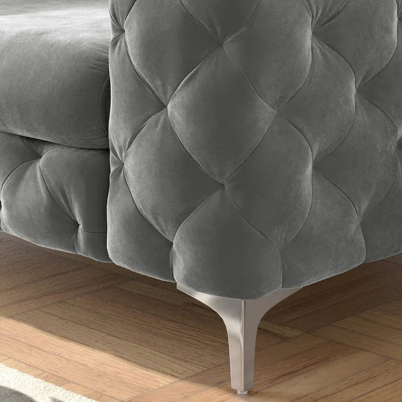 Fauteuil club en velours capitonné